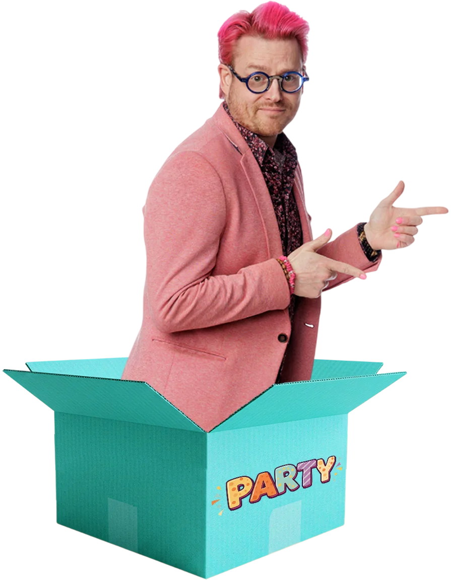 Dave Brenn pointing while popping out of a blue party box